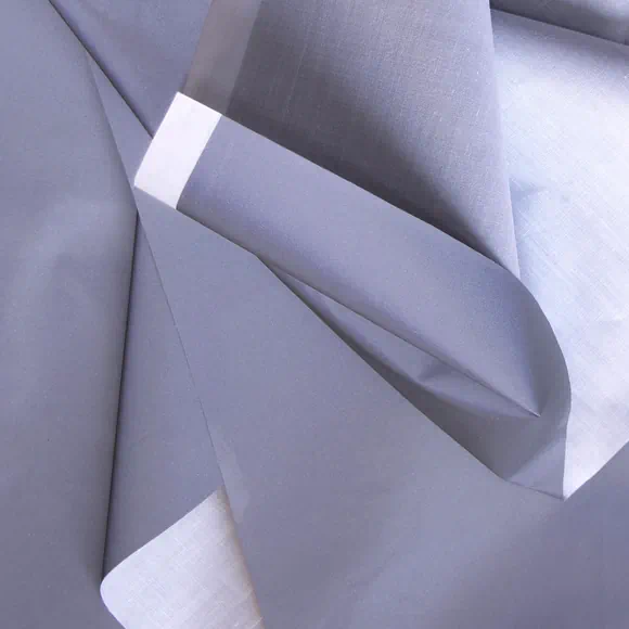 Tela reflectiva con base impermeable por metro y por rollo, Telas Bogotá