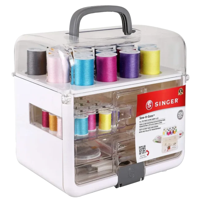 Kit de Costura Singer Sew-It-Goes abierto con hilos, tijeras y accesorios.