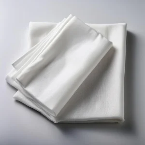 Tela de batista fina y suave en color blanco, ideal para prendas ligeras y ropa de cama.