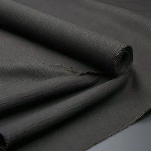 Imagen de una tela resistente al fuego, mostrando su textura duradera y propiedades ignífugas.